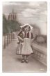 画像1: Postcard　ウサギのぬいぐるみを持つオランダ服の女の子　1915年 (1)