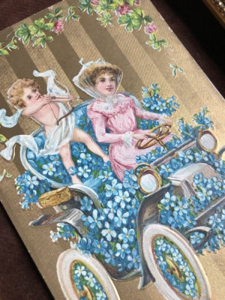 画像3: Postcard バレンタイン 忘れな草の花車を運転する女性を射止めるキューピッド (3)