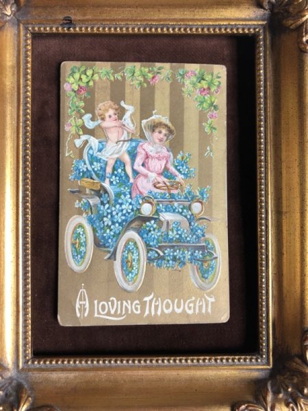 画像2: Postcard バレンタイン 忘れな草の花車を運転する女性を射止めるキューピッド (2)