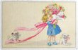 画像1: Postcard 　アンティークポストカード　大きな花束を持つ女の子と白い犬　Fritz Baumgarten ？ (1)