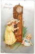 画像1: Postcard　アンティークポストカード　新年祝い　New Year　大きな時計と女の子　子猫　アメリカ1909年 (1)