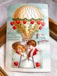 画像2: Postcard　アンティークポストカード　バレンタイン　Valentine's Day　ハートの気球に乗る二人　Ellen Clapsaddle　1910年 (2)