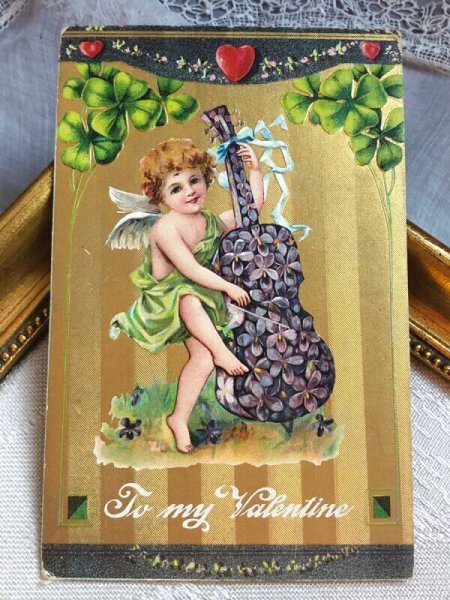 画像2: Postcard   アンティークポストカード バレンタイン 天使とお花の楽器 スミレのチェロ アメリカ1911年 (2)