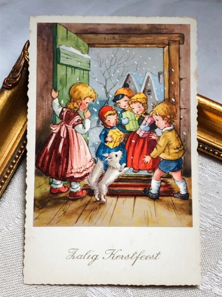 画像2: Postcard  アンティークポストカード クリスマス 新年祝い 子ども達と白い犬 スピッツ (未使用) (2)