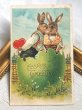 画像2: Postcard　アンティークポストカード　イースター  大きな卵の中で愛をささやくウサギさん (2)