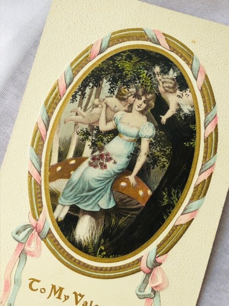 画像2: Postcard　アンティークポストカード　新年祝い　New Year　キノコに座る女性にキスをする天使 (2)