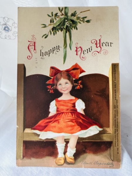 画像1: Postcard  アンティークポストカード　新年祝い　New Year　ヤドリギの下の女の子　Ellen Clapsaddle (1)