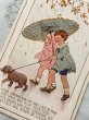 画像2: Postcard  アンティークポストカード　雨の中を犬と一緒に散歩する子どもたち　傘　The Sunshade Series  Margaret Tarrant　 (2)