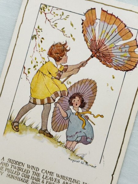 画像2: Postcard  アンティークポストカード　風で傘が裏返ってしまった女の子　The Sunshade Series  Margaret Tarrant　 (2)