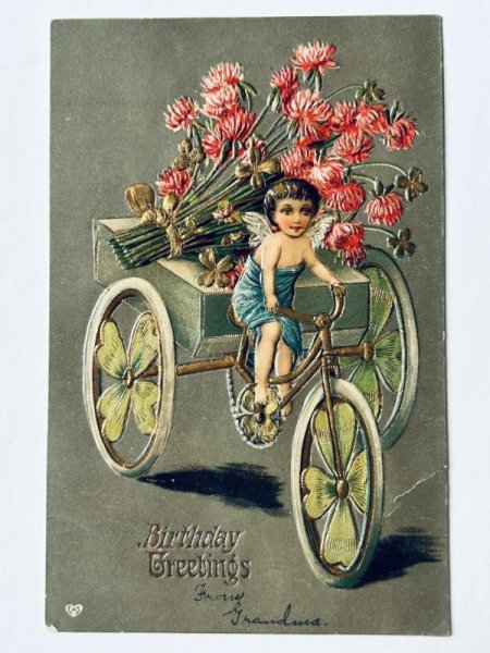 画像1: Postcard  アンティークポストカード　三輪車でアカツメクサのお花を運ぶ天使　四つ葉クローバー (1)