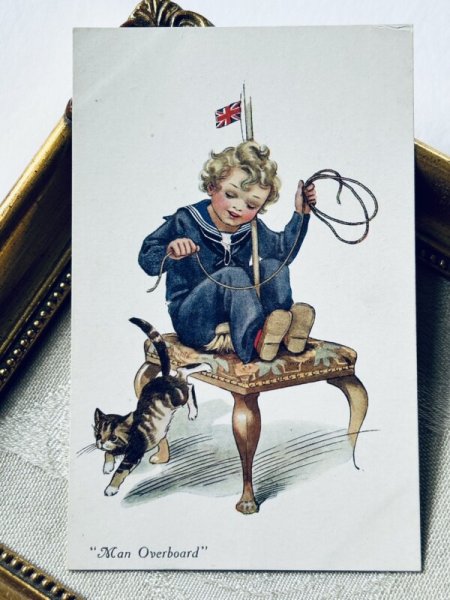 画像2: Postcard アンティークポストカード 船乗り(カウボーイ?)ごっこをして遊ぶ男の子と猫 イギリス (未使用) (2)