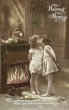 画像1: Postcard　アンティークポストカード　クリスマス　新年　ヤドリギの下でキスをする女の子　暖炉　時計　写真　フランス (1)